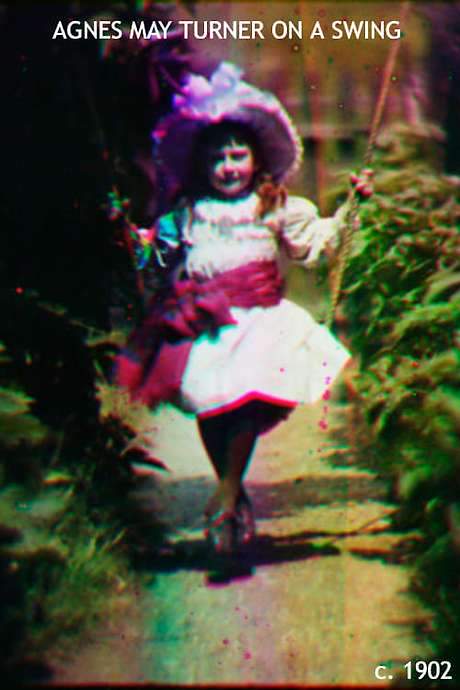    Agnes May Turner on a swing, early color film.  